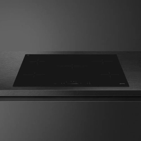 картинка Электрическая варочная панель Smeg SE495ETD магазин SEFI являющийся официальным дистрибьютором в России  картинка Электрическая варочная панель Smeg SE495ETD от магазина SEFI