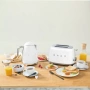 картинка Тостер Smeg TSF01WHEU от магазина SEFI